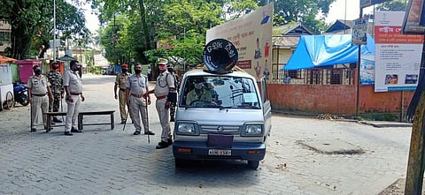 Policemen patrolling a street in Silchar town (Photo | EPS)