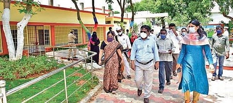 Collector I Samuel Anand Kumar inspects the renovated school at Kuchipudi village in Guntur district. (Photo | Express)