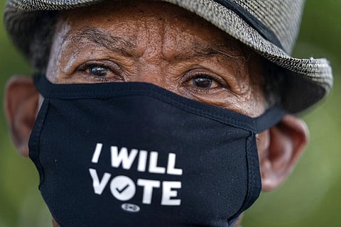 Walter Carter, 74, of Woodbridge, Va., who attended the original March on Washington, attends 2020's March on Washington. (Photo | AP)