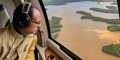 Madhya Pradesh CM Shivraj Singh Chouhan conducts an aerial survey of flood-affected areas in Bhopal. (Photo | PTI)
