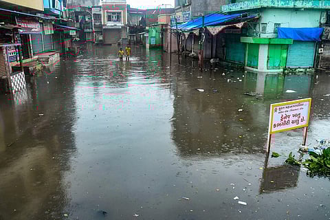 A low-lying area waterlogged following heavy rainfall in Surat. (Photo| PTI)