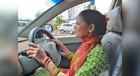 A woman who underwent driving training.