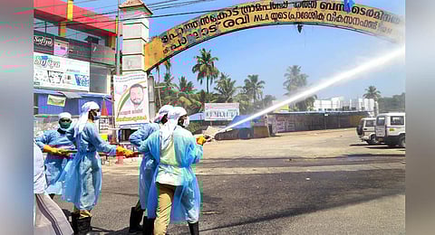 Sanitation workers carrying out disinfection drive in Thiruvananthapuram. (Photo | Vincent Pulickal, EPS)
