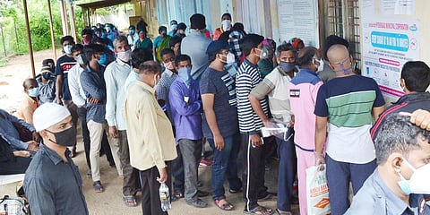 People stand in queue without social distance to get COVID-19 tests at a fever hospital in Hyderabad. (File photo| RVK Rao, EPS)
