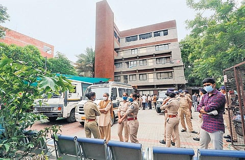 Police stand outside Shrey Hospital in Ahmedabad on Thursday | Pti