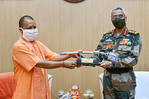 UP CM Yogi Adityanath with Chief of Indian Army General MM Naravane during a meeting at his residence in Lucknow on Friday. (Photo | PTI)