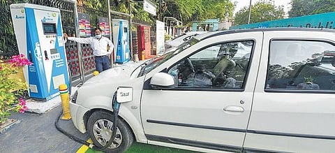 Vehicles being charged at India’s first EV charging plaza in New Delhi | PTI File