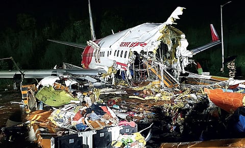 The mangled wreckage of the Air India Express plane from Dubai that skidded off the runway at the Kozhikode airport | PRD