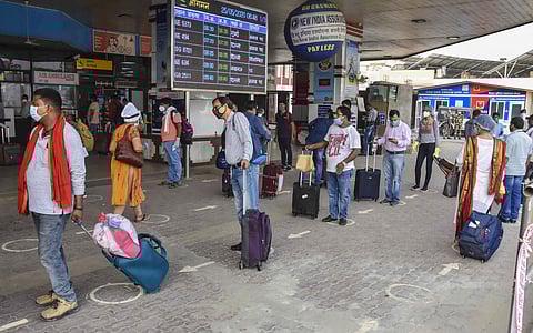 Passengers maintain social distance as they arrive at Jai Prakash Narayan International Airport. (Photo | PTI)