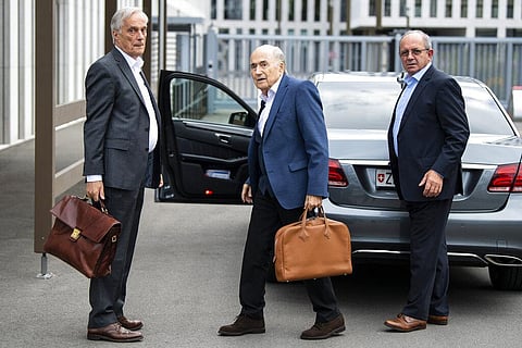 Former FIFA President Sepp Blatter, center, appears in front of the building of the Office of the Attorney General of Switzerland, on Tuesday (Photo | AP)