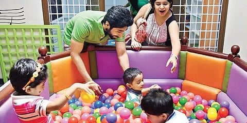 Children with their parents at the playschool Photos: Sunish P Surendran