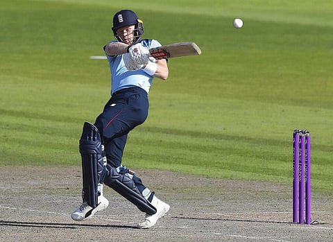 England's Sam Billings plays a shot during the second ODI cricket match between England and Australia, at Old Trafford in Manchester, England, Sunday, Sept. 13, 2020. (Photo | AP)