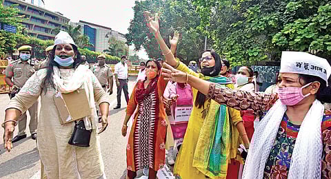 Aam Aadmi Party workers protest against civic bodies demanding pending salaries of MCD employees in the national capital | Express