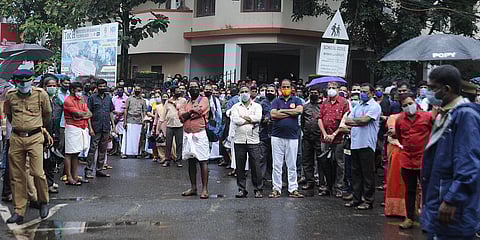 Parents anxiously wait for their wards, who are appearing for the NEET exam, outside a centre in Kochi. (Photo| A Sanesh, EPS)