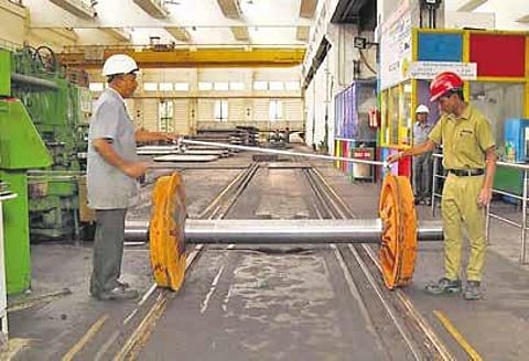 Workers at the Rail Wheel Factory in Yelahanka, which turned 37 on Tuesday | express