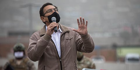 Peru's President Martin Vizcarra talks to doctors and soldiers before the start of a house-to-house coronavirus testing drive near Lima. (Photo| AP)