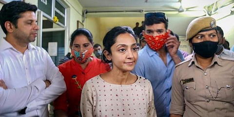 Star couple Diganth and Aindrita at the CCB office in Bengaluru on Wednesday. (Photo | PTI)
