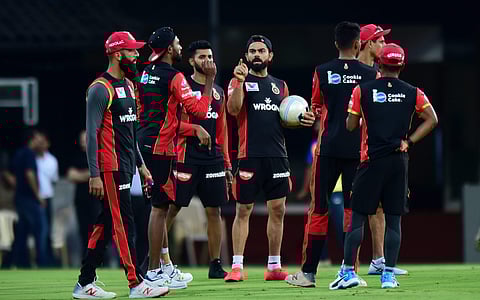 Skipper of Royal Challengers Bangalore RCB Virat Kohli along with teammates at a practice session. (Photo | PTI)