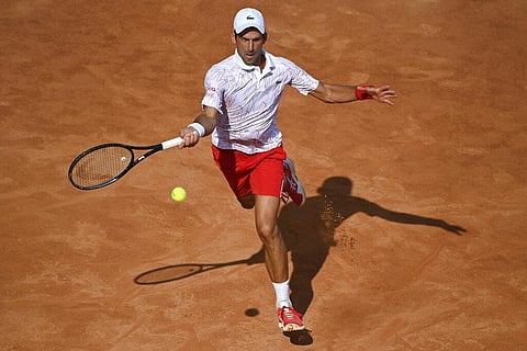Serbia's Novak Djokovic returns the ball to Serbia's Filip Krajnovic during their Italian Open tennis tournament match, in Rome, Friday, Sept. 18, 2020. (Photo | AP)