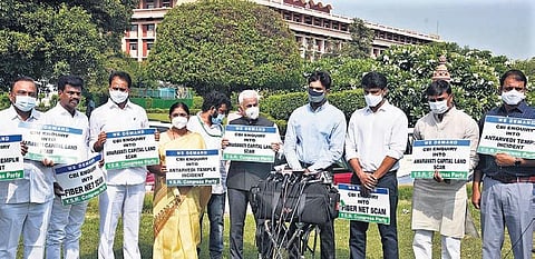 YSRCP MPs protest demanding CBI inquiry into Amaravati land scam and fiber grid scam, in Delhi on Friday. (Photo I EPS/PARVEEN NEGI)