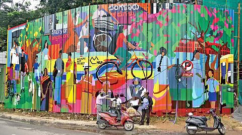 The mural features common city sights and landmarks like BMTC buses and Karnataka High Court building , Vinod Kumar T