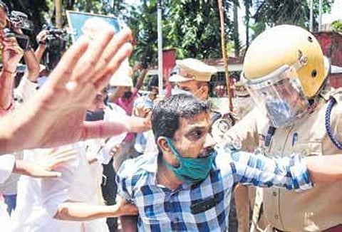 Police and protesters clash during the Congress’ strike in front of the city commissioner’s office in Kozhikode demanding the arrest of those involved in attacks on the party offices | Express
