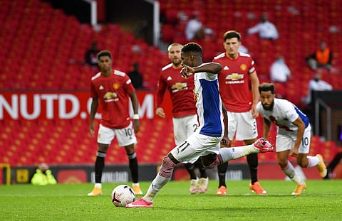 Crystal Palace's Wilfried Zaha scores his side's second goal during the English Premier League soccer match between Manchester United and Crystal Palace at the Old Trafford stadium. (Photo | AP)