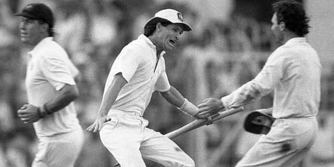 Australian batsman Dean Jones holds the stumps as he races to embrace team captain Allan Border (R) in a moment of jubilation, in Kolkata. (File photo| AP)