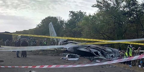 A view of the debris and remains of the AN-26 military plane which crashed on Friday night, in the town of Chuguyiv. (Photo| AP)