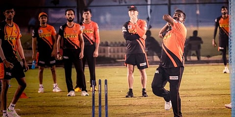 Muttiah Muralitharan leads a SRH training session. (Photo | SRH Twitter)