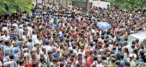 Medical aspirants and their parents waiting outside a NEET examination hall in Chennai. (File photo | Express)