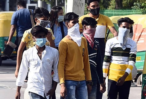 People not maintaining social distancing in New Delhi on Sunday. (Photo | Parveen Negi/EPS)