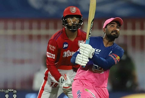 Rajasthan Royals batsman Rahul Tewatia plays a shot during the Indian Premier League 2020 cricket match against Kings XI Punjab at Sharjah Cricket Stadium. (Photo | PTI)