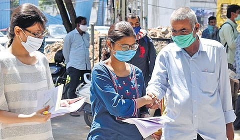 Candidates at a JEE exam centre in Hyderabad on Sunday (Photo | S Senbagapandiyan, EPS)