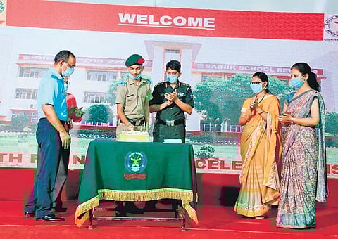 Cadets cut a cake to celebrate the Founder’s Day of Sainik School Rewari. (Photo | EPS)