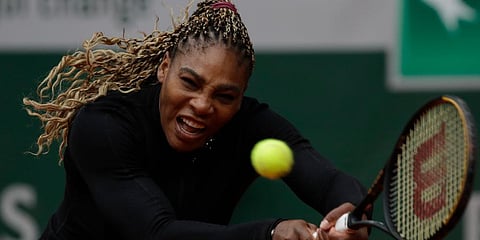 Serena Williams plays a shot against Kristie Ahn in the first round match of the French Open tournament at the Roland Garros stadium in Paris. (Photo | AP)