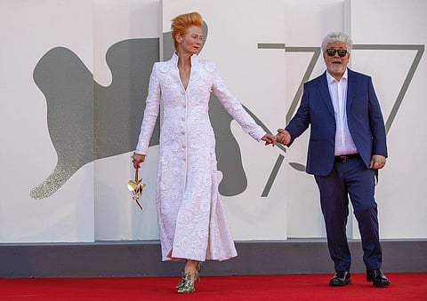 Director Pedro Almodovar, right, and actress Tilda Swinton pose on the red carpet of the movie 'The human voice' during the 77th edition of the Venice Film Festival (Photo | AP)