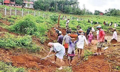 Charaka founder and activist Prasanna along with the society members desilt the Virupaksha tank in Heggodu gram panchayat limits | express