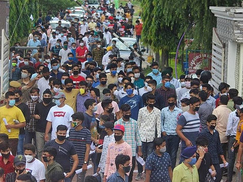 Students after JEE (Mains) exam at a centre in national capital on Sunday (Photo | PTI)