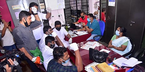 Youth Congress and Yuva Morcha workers staging a protest at the District Medical office at Pathanamthitta condemning the rape of a COVID patient. (Photo| Shaji Vettipuram, EPS)