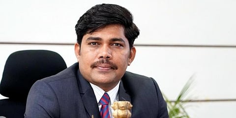 IAS officer Ramesh Gholap at his office in Koderma. (photo| Special Arrangement)