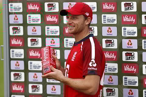 England's Jos Buttler poses with his man of the match award. (Photo | AFP)