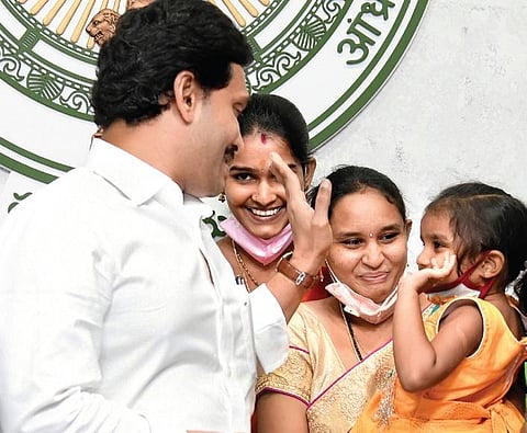 CM YS Jagan Mohan Reddy during the launch of YSR Sampoorna Poshana schemes at his camp office in Tadepalli on Sunday.