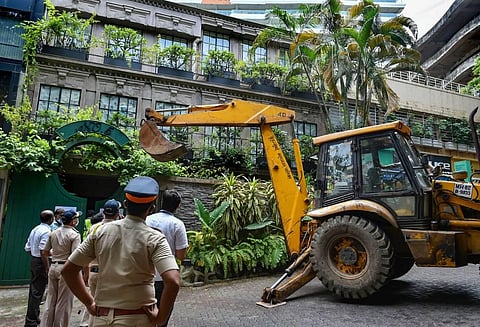 BMC officers demolish 'illegal alterations' at the Bandra bungalow of Bollywood actress Kangana Ranaut in Mumbai Wednesday Sept. 9 2020. (Photo | PTI)