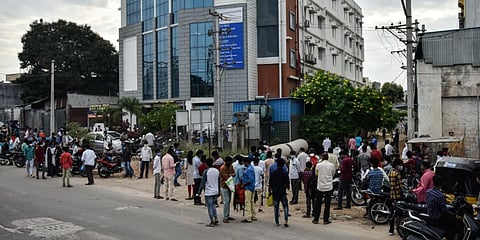 Students appearing for TS-EAMCET standing in queue to enter the examination hall at TCS ION Digital Zone LB Nagar. (Photo| Vinay Madapu, EPS)