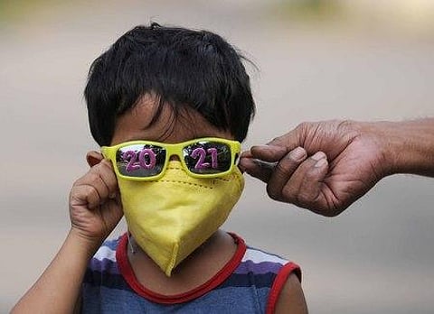 A child seen in 2021 goggles and a mask as precaution against COVID-19. (Photo | A Sanesh, EPS)