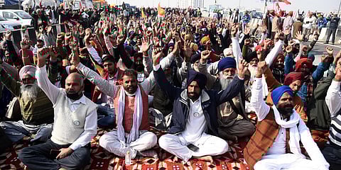 Farmers shout slogans during a protest at the Delhi-Uttar Pradesh state border in Ghazipur on December 20 2020. (Photo | Parveen Negi, EPS)