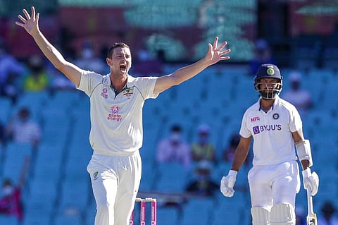 Australia's Josh Hazlewood appeals unsuccessfully for the wicket of India's Cheteshwar Pujara, right, during play on day four of the third cricket test at the Sydney Cricket Ground. (Photo | AP)
