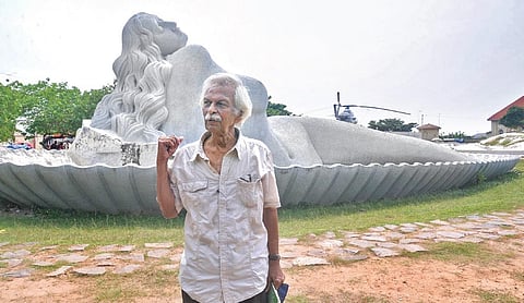 Sculptor Kanayi Kunhiraman in front of the Mermaid statue at Shankhumugham in Thiruvananthapuram | Vincent Pulickal