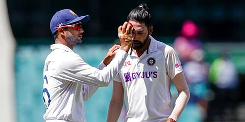 Mayank Agarwal rubs the ball on the face of Mohammed Siraj during play on day four of Sydney Test. (Photo | AP)